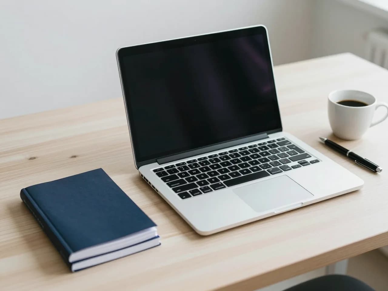 Portatile e guide di Nexia Home sulla scrivania